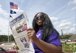 A reader enjoys the May 2013 edition of the Bruin student newspaper.