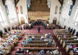 KCC choir members perform in a church in Battle Creek.