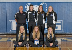 Volleyball sophomores pose with their coaches