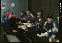 A Library of Congress photo from 1943 titled "Women workers employed as wipers in the roundhouse having lunch in their rest"