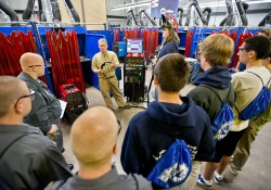 A welding instructor addresses high school students during a manufacturing day at the RMTC.