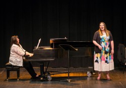KCC student Amanda Adams sings on stage during a recital.