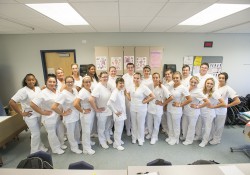 CNA students pose for a group photo during class.