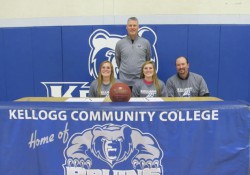Pictured, from left to right, are women's basketball player Sydney Macomber, head women's basketball coach Klingaman, women's basketball player Taylor Macomber and Morgan Macomber (father).
