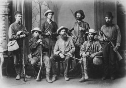 An archival image of hunters posing for a group photo. Part of the Kingman Museum photo archives on display at KCC through the end of 2016.