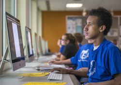 A student practices work on a computer in KCC's Graphic Design Lab.