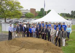 Representatives from Kellogg Community College and the Miller Foundation break ground at the construction site of the new Miller Physical Education Building on the college’s North Avenue campus in Battle Creek.
