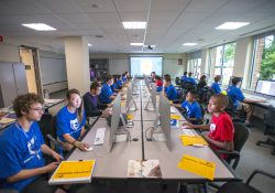 Youth summer campers work on computers during a summer camp at KCC.