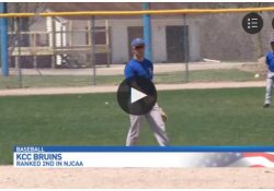 A screenshot of a WWMT Newschannel 3 video featuring KCC's baseball team, showing some players at practice.