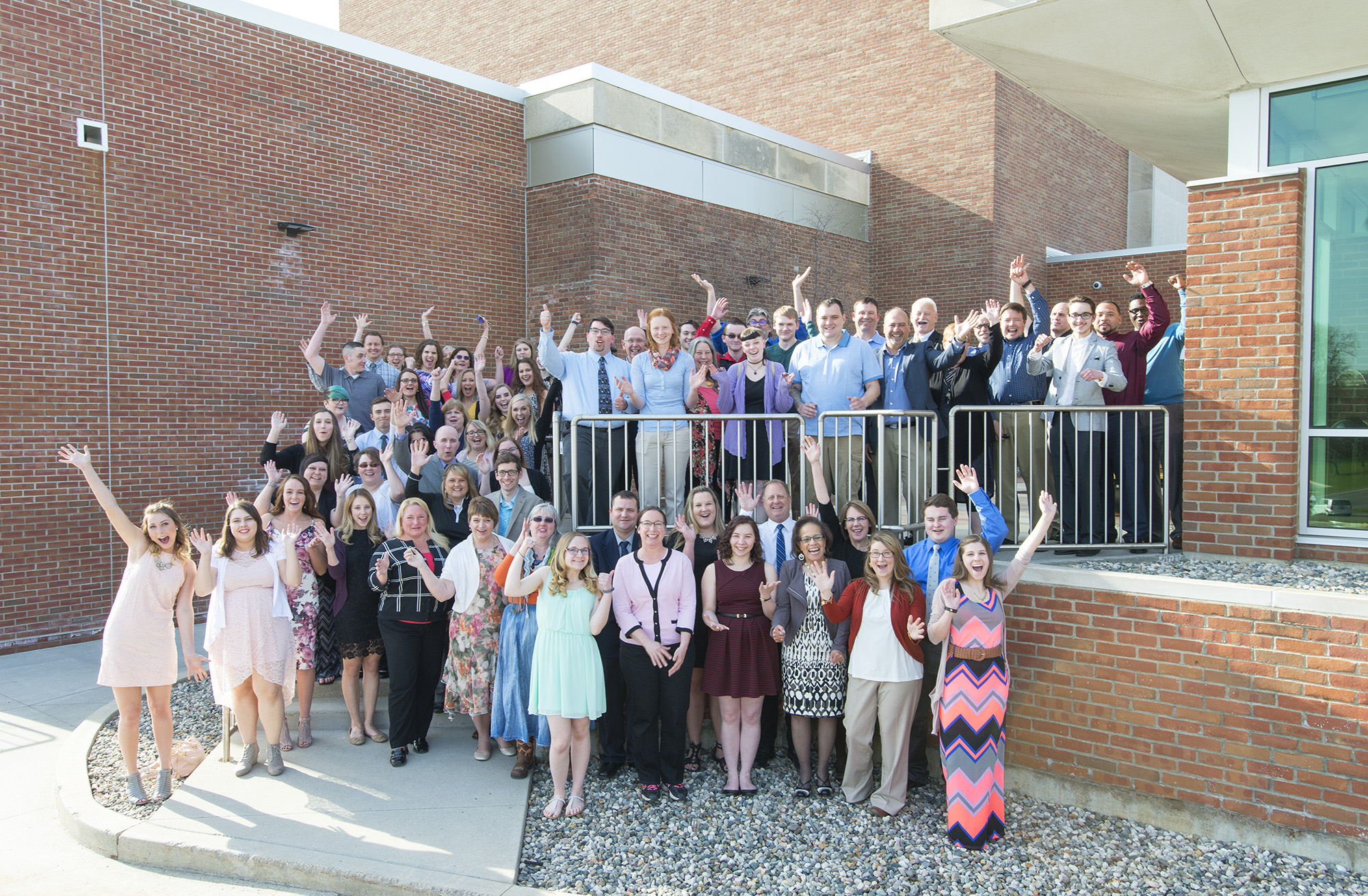 Student Outstanding Bruin Award recipients and staff presenters pose for a group photo outside the Kellogg Room on KCC's North Avenue campus in Battle Creek.