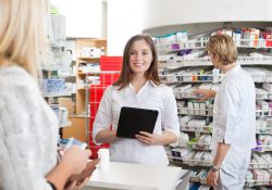 Stock photo of a female pharmacist working.