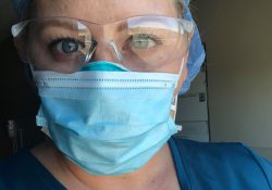 Nursing student Rachel Rewa wearing safety glasses and a facemask.