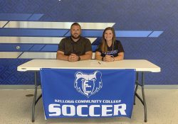 Pictured, from left to right, are Head KCC Women’s Soccer Coach Levi Butcher and Chloe Leugers.