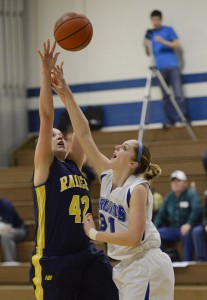 KCC's Britni Upston tries for a block against GRCC on Wednesday.