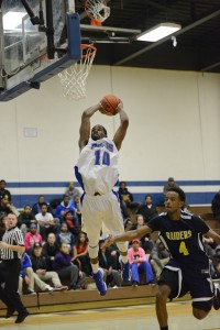 KCC's Christian Covile goes up for a dunk against GRCC on Wednesday.