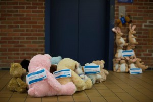The donated stuffed animals line up at an elevator, waiting to be delivered to area emergency personnel late last month. 