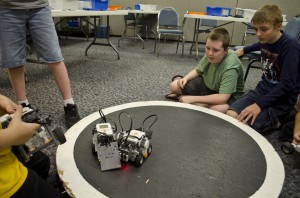 Participants watch robots battle during a Lego Robotics camp held last summer at the RMTC.