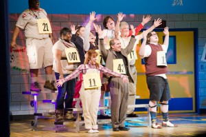KCC President Dennis Bona gets into the act as a guest speller in Friday night's presentation of "The 25th Annual Putnam County Spelling Bee." Photo by photographer Nick Garrison.