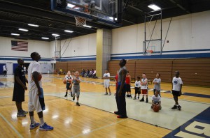 A photo from a basketball camp for kids led by members of the men's basketball team last spring at the Miller Gym.