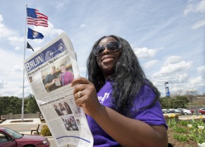 A reader enjoys the May 2013 edition of the Bruin student newspaper.