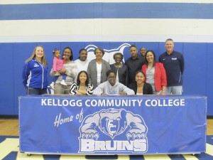 Pictured above are KCC's assistant women's basketball coach Julie Hargreaves (far left), Patrice Matthews (center) and KCC's head women's basketball coach Kyle Klingaman (far right), along with several of Matthews' family members.