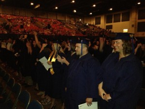 Diplomas conferred, the latest crop of KCC grads turns tassels and walks into the future. Photo by Eric Greene.