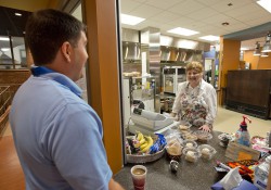 VetSuccess on Campus counselor Brent Haddow orders breakfast at KCC's Bruin Bistro.