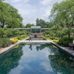 KCC student Kapri Smith walks between reflecting pools on the North Avenue campus.