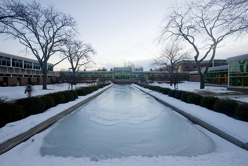 A view of the reflecting pools on KCC's North Avenue campus, covered in ice