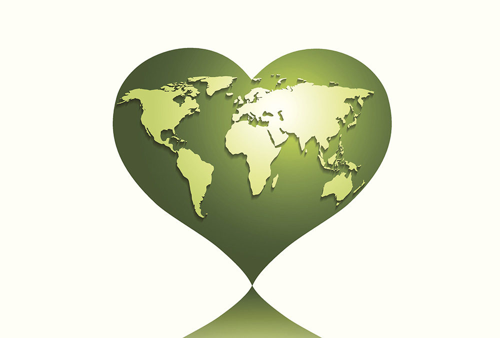 Stock photo of the earth in a heart shape for Earth Day.