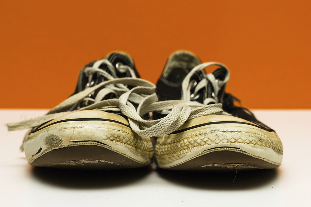 A pair of worn-out shoes