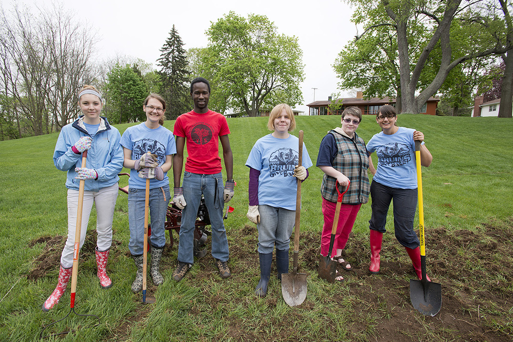 KCC students and staff pose while breaking ground for the College's new community garden.