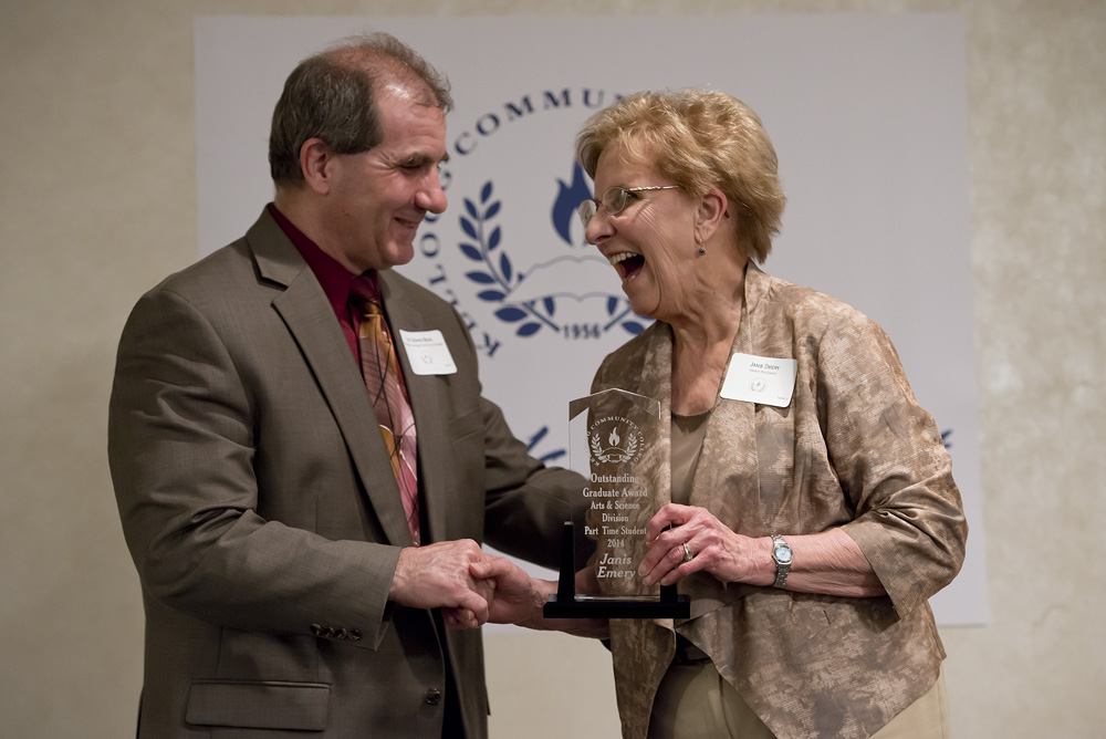 Music student Janis Emery accepts an award from KCC President Dr. Dennis Bona during the 2014 Awards Banquet.