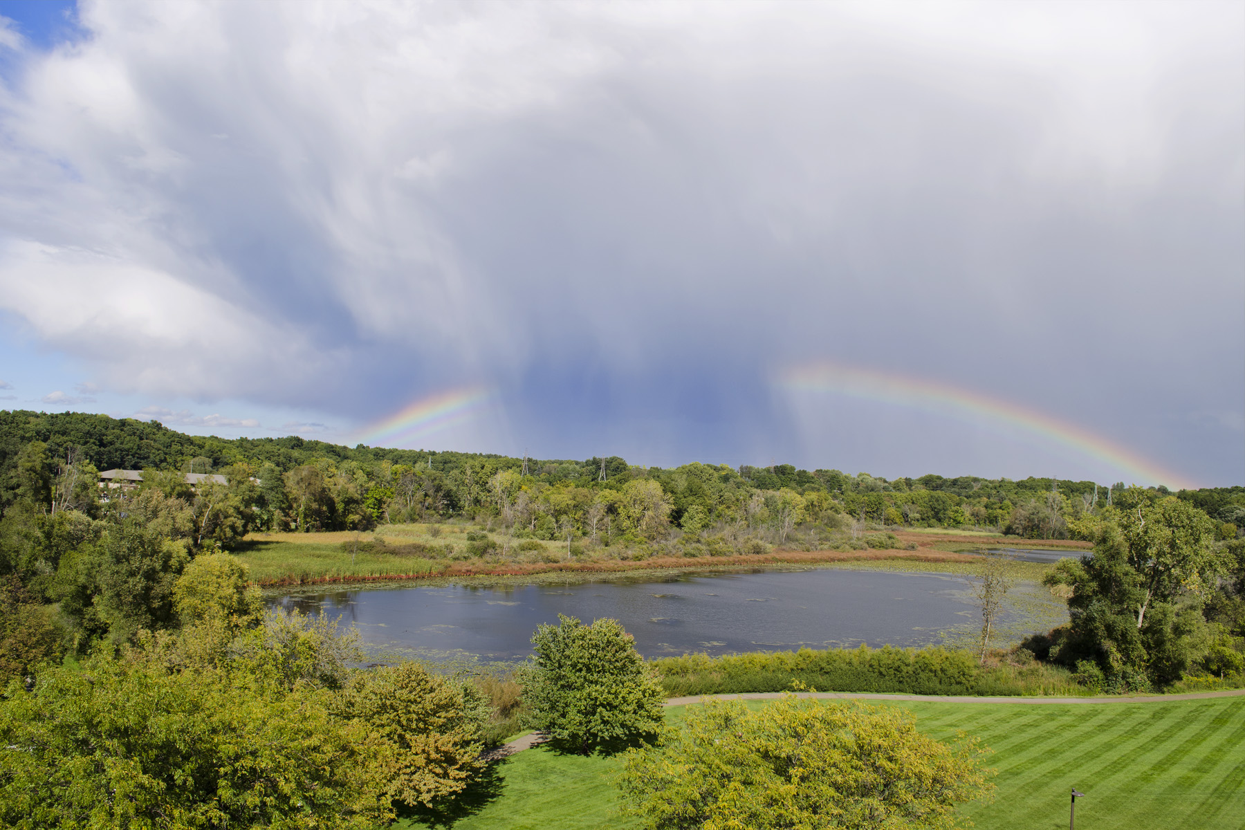 A rainbow over Spring Lake on KCC's North Avenue campus.