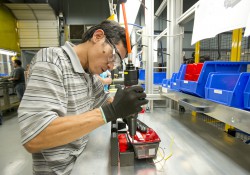 A manufacturing student trains at the RMTC.
