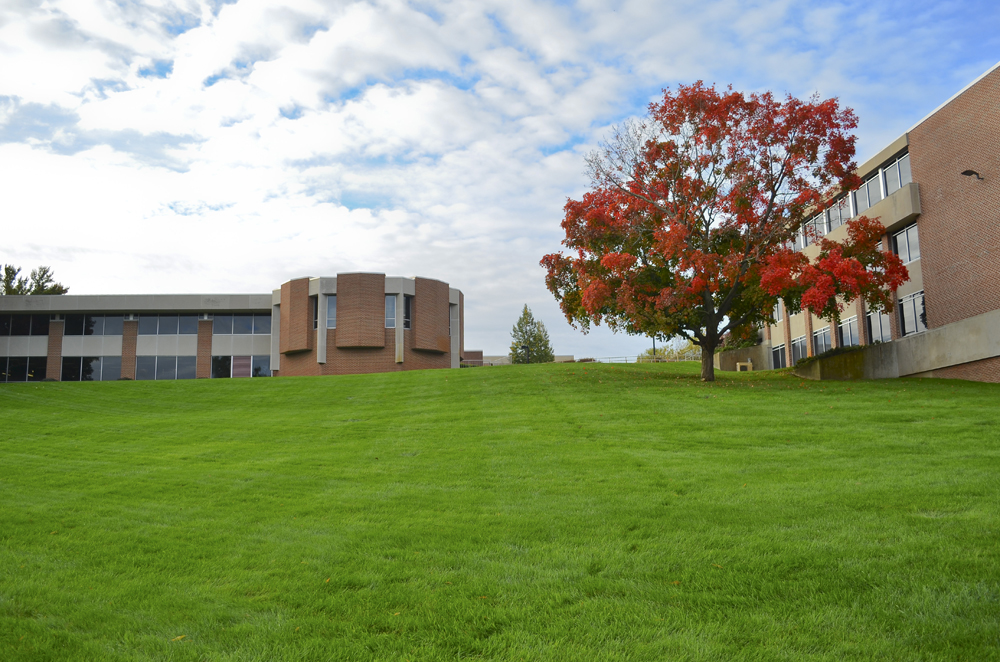 A view looking up the hill on the North Avenue campus toward the library and the Spring Lake Room