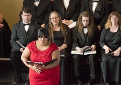 Vocal instructor Carmen Bell performs at a choir event in Battle Creek.