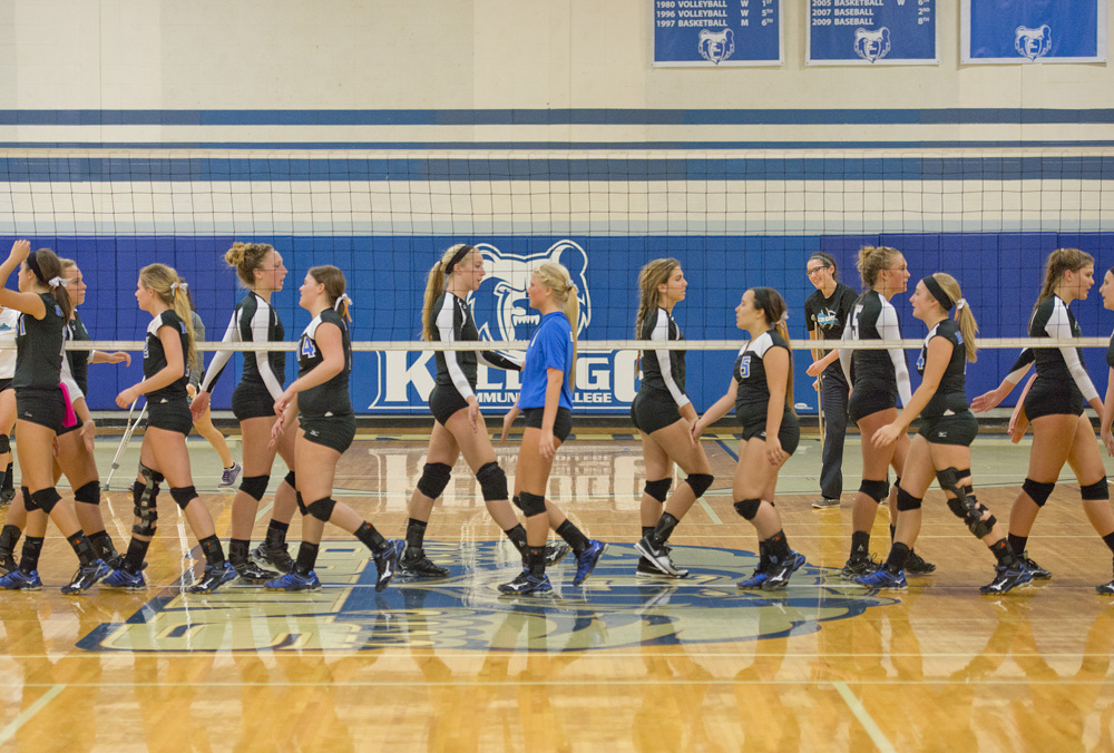 The women's volleyball team shakes hands with the opposing team after a match at the Miller Gym.