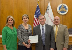 KCC President Dr. Dennis Bona, KCC Foundation Executive Director Teresa Durham and KCC Foundation Board of Directors Chair Kathy-Sue Dunn receive a check for $10,000 to continue funding of the FLRSB Scholarship Program. The three are pictured here with Calhoun County Board of Commissioners Chair Art Kale.