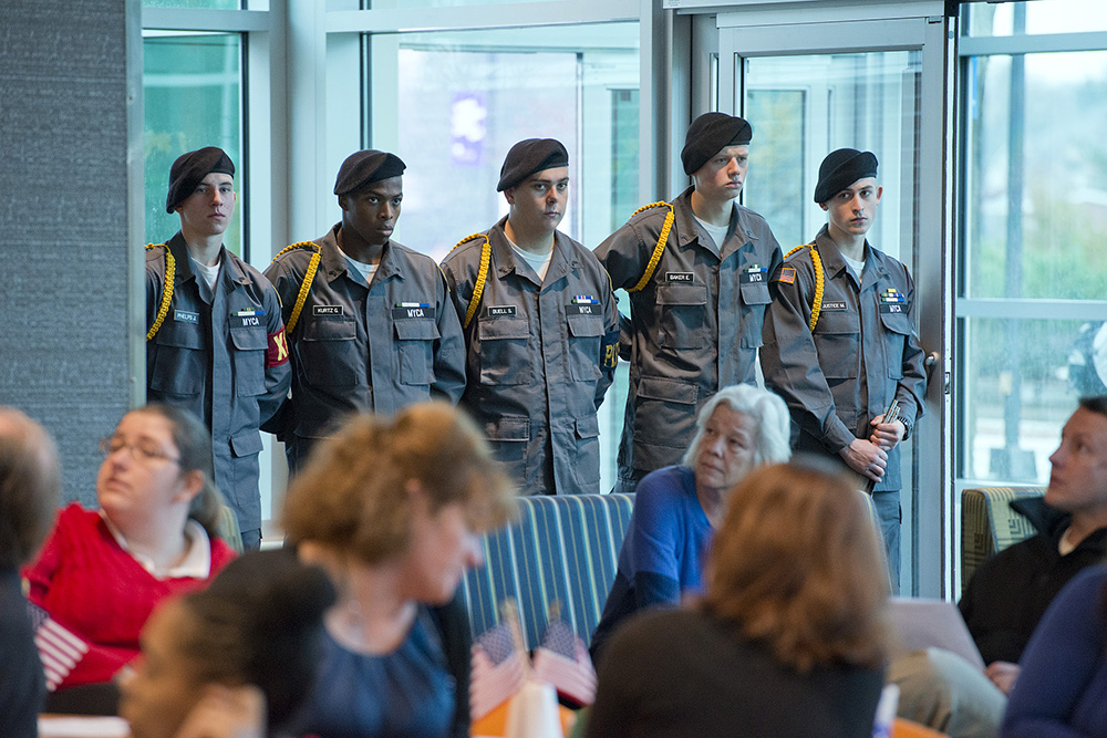 Soldiers stand during a Veterans Day ceremony in the Student Center at KCC
