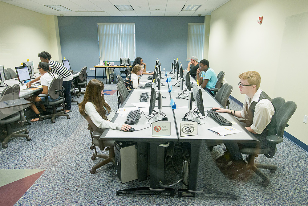 Students take tests on computers in the Testing and Assessment Center on the North Avenue campus