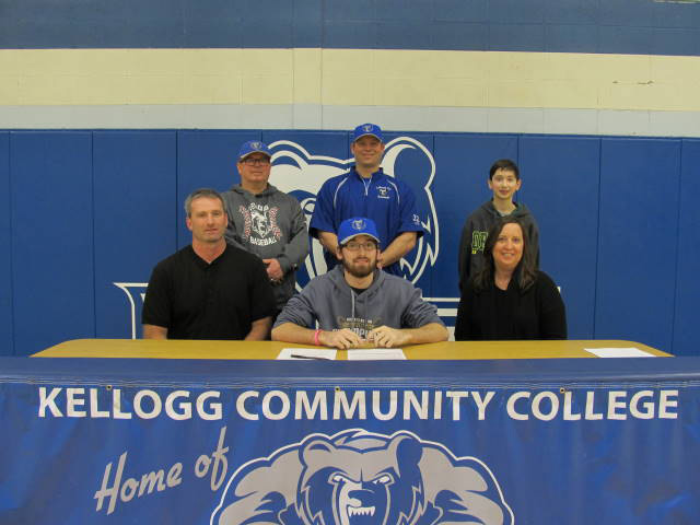 New KCC baseball signee Connor Adams poses in a KCC signing photo with KCC baseball coaches and some family members