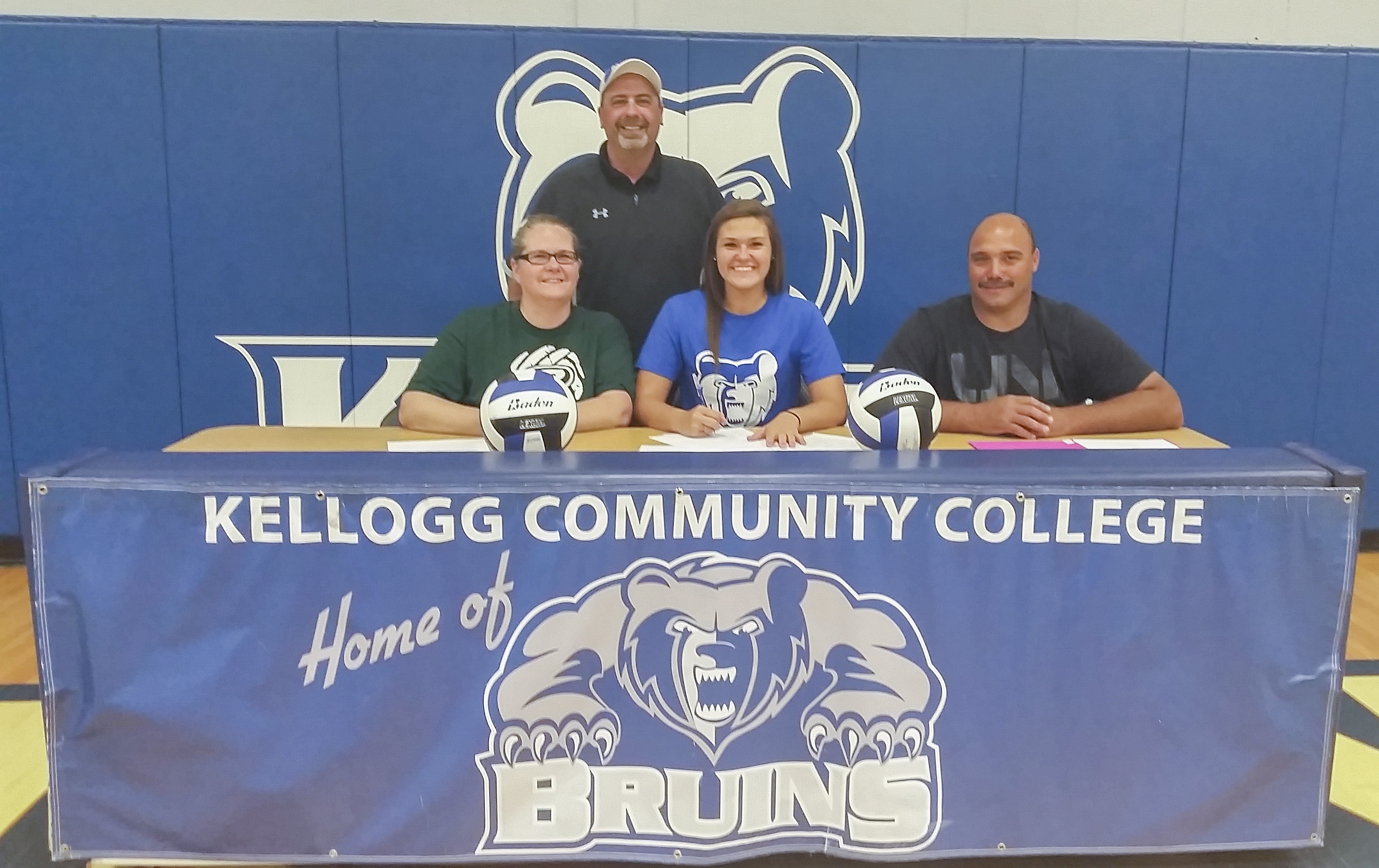 Pictured in this signing photo are, in the front row, from left to right, Susan Ritter (mother), Aubrey Ritter and Donnie Ritter (father); and in the back row, KCC's head women's volleyball coach Tom VanWienen.