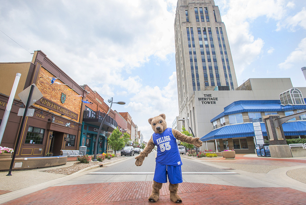 KCC mascot Blaze stands in the middle of a street in downtown Battle Creek.