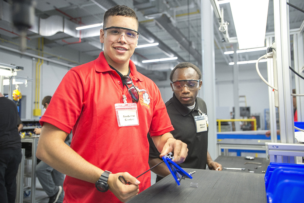 KAMA manufacturing students work during training at the RMTC.