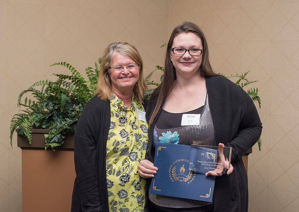 Cory Farfan, right, accepts the award for Outstanding Office Information Technology Graduate 2017 from KCC OIT instructor Robin Hunter at the College's annual Awards Banquet ceremony, held at the Battle Creek Country Club on April 27.