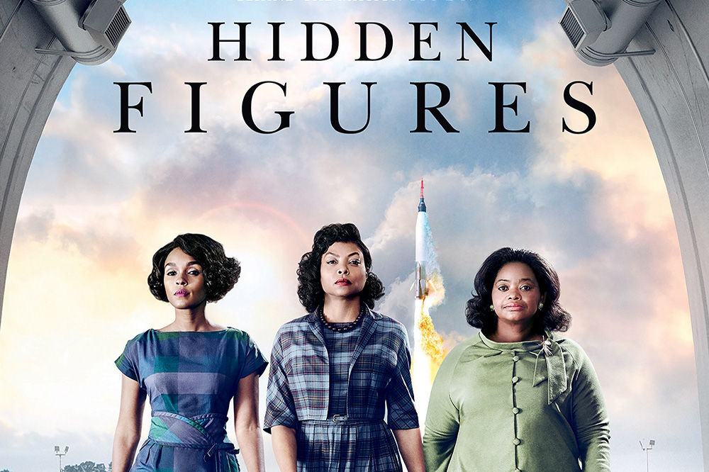 A crop from the poster for the movie "Hidden Figures," featuring the three main characters walking toward the camera as a rocket launches behind them.