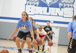 Participants in KCC's Girls' Basketball Camp work on drills in the Miller Gym.