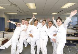 CNA students pose for a group photo in the CNA Lab on KCC's North Avenue campus in Battle Creek.