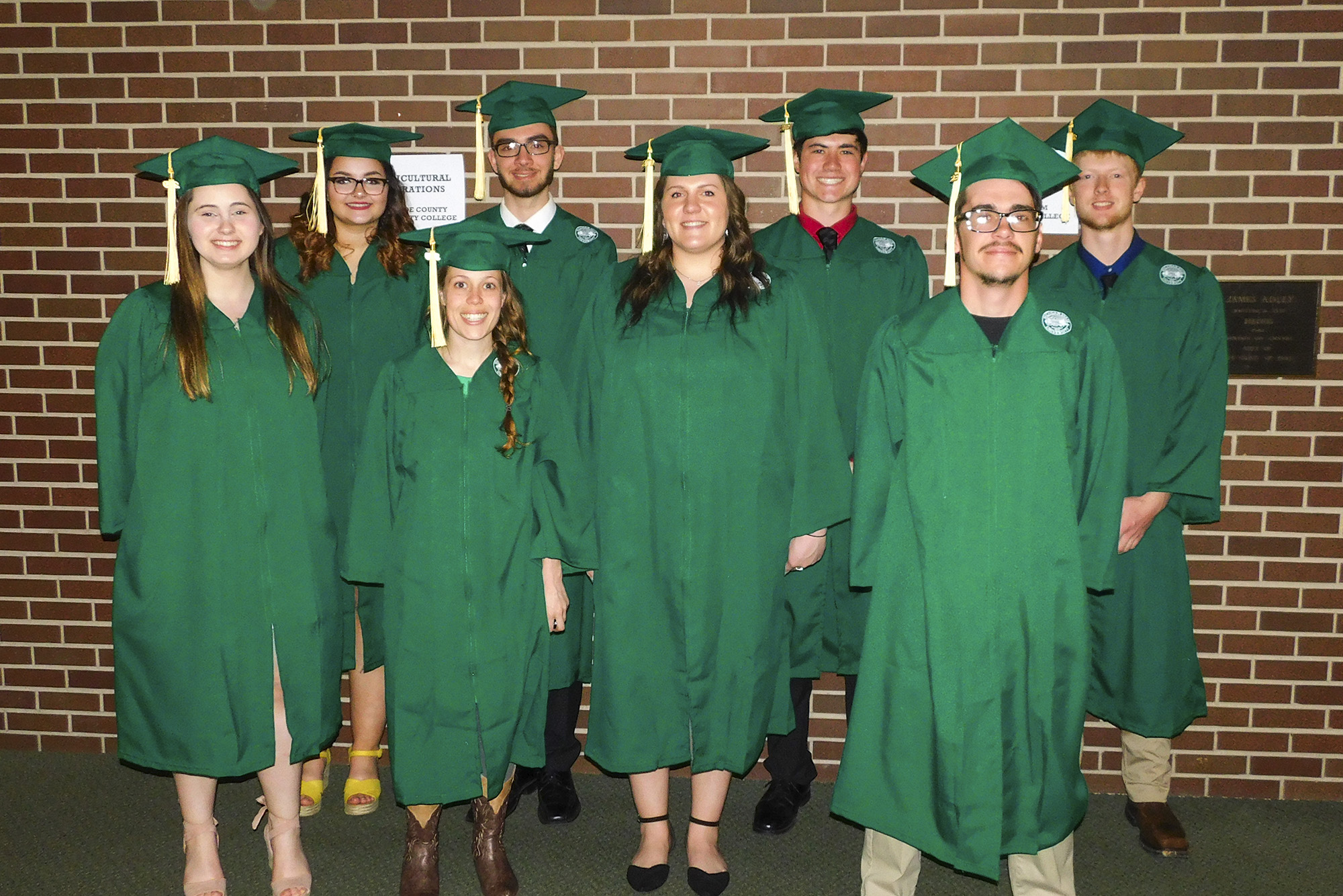 Pictured after their MSU graduation last month are KCC's first Agricultural Operations Program graduates, in the front row, from left to right, Kelsey Harmon, Crystal Raynes, Kaycee Klaren and Benjamin Geibig. In the back row, from left to right, are Breanne Marske, Ean Johnson, Jacob Shilling and Dwight Devenney. Photo courtesy of Kaite Fraser.